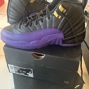 Jordan 12 Retro Black and Purple Sneakers with Gold Logo